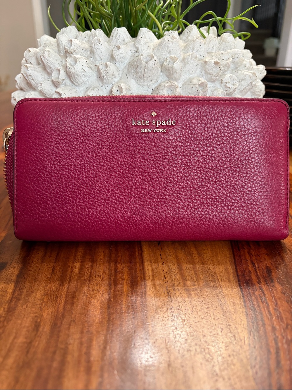 kate spade raspberry Margaux pebbled leather zip-around wallet with gold logo